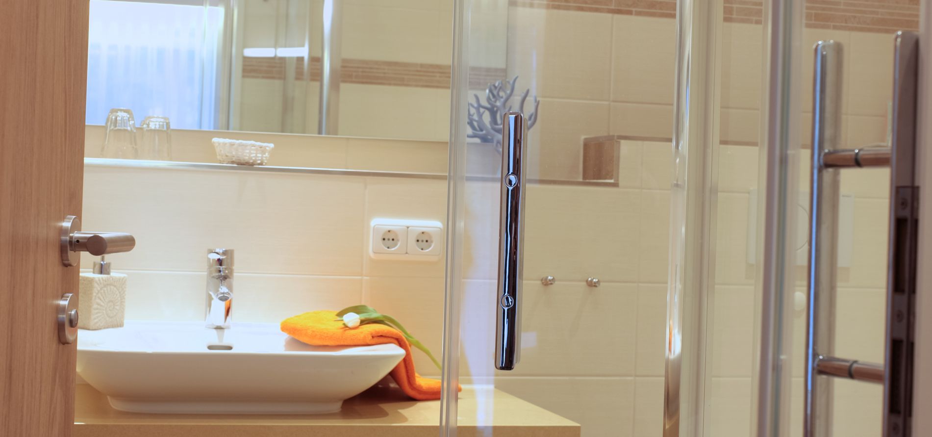 Badezimmer im Hotel Pension Fortuna - Das Salzhotel